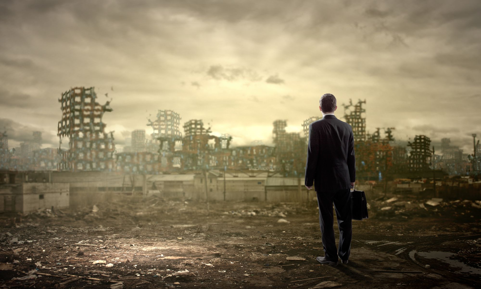 illustration of catastrophic thinking with man with briefcase standing in front of ruined city